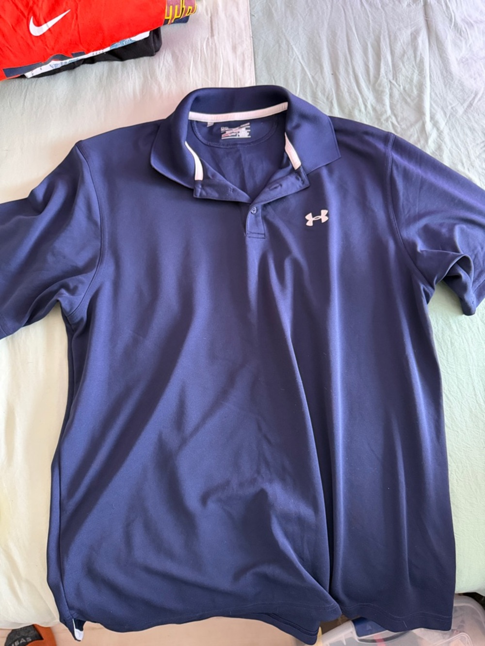 Under Armour Navy Blue Men's Polo with White Logo Accents